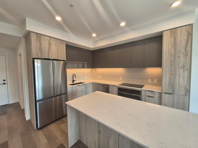 Building Photo - 3564 A-3564 Ryder Hesjedal Way