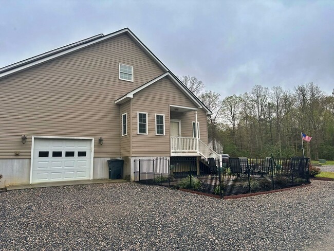 Building Photo - Enjoy the perks of country living without ...
