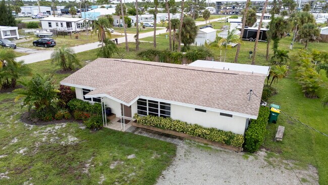 Building Photo - 3-bedroom home offers approximately 1,144 square feet of living space, an attached garage, an ove...