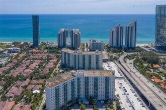 Building Photo - 19380 Collins Ave
