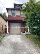 Building Photo - 8814 N Curtis Ave