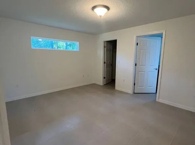 Building Photo - Brand new construction Charming 4BR 2BA in...