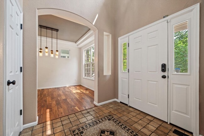 Building Photo - Stunning Tennyson Park Home | 4 Bedrooms, Finished Basement & Open Space Views