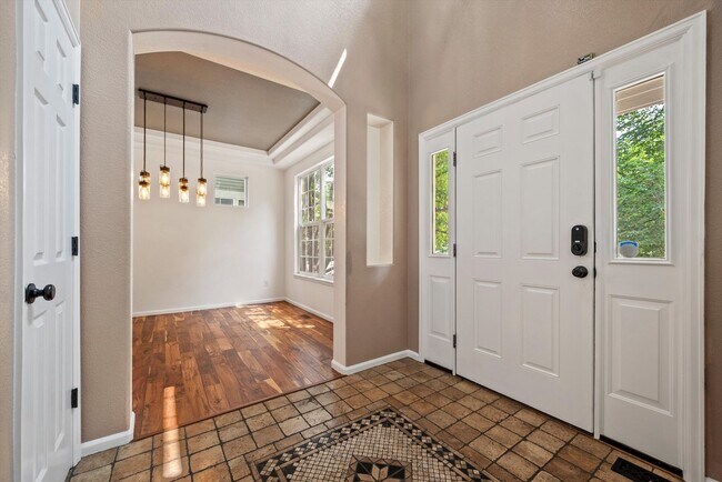 Foto del edificio - Stunning Tennyson Park Home | 4 Bedrooms, Finished Basement & Open Space Views