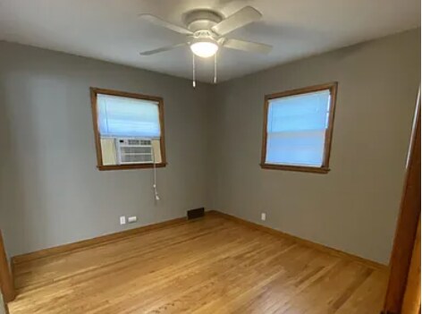Bedroom with Window Air Conditioner. - 1028 S 24th St