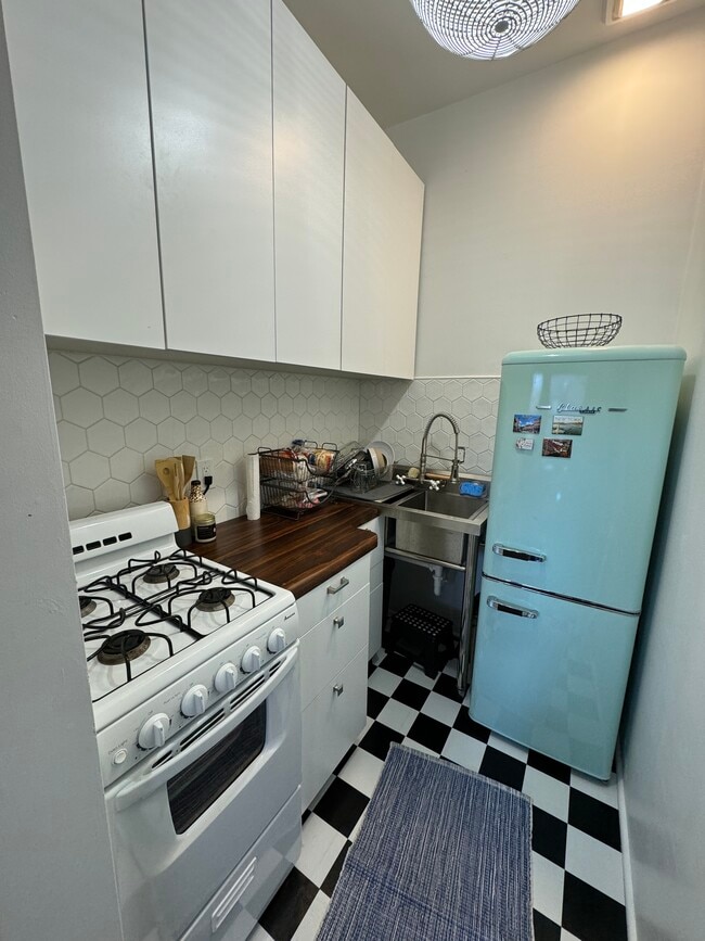 Kitchens are cutely updated. - 811 E College St