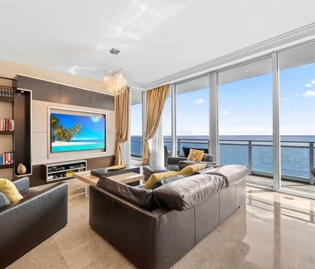 Building Photo - 10295 Collins Ave