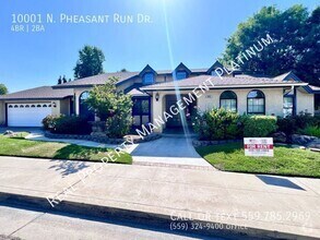 Building Photo - 10001 N Pheasant Run Dr