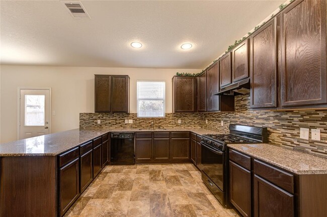 Foto del edificio - 10907 Woodland Leaf Ln