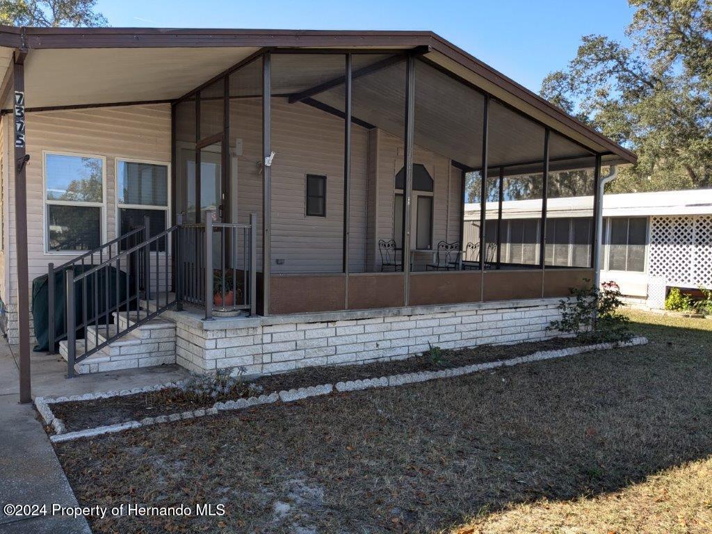 Primary Photo - 7375 2nd Loop Ave