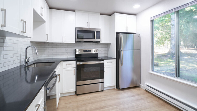 Kitchen with Stainless Steel Appliances - Redmond Court