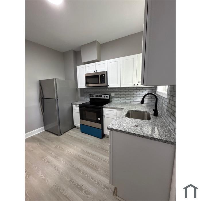 Primary Photo - 3 Bedroom Home
