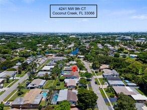 Building Photo - 4241 NW 9th Ct