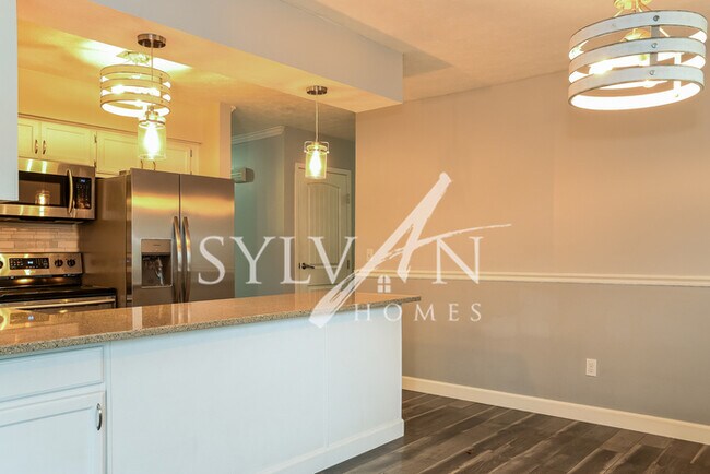 Building Photo - The living is easy in this 3 bedroom, 2 ba...
