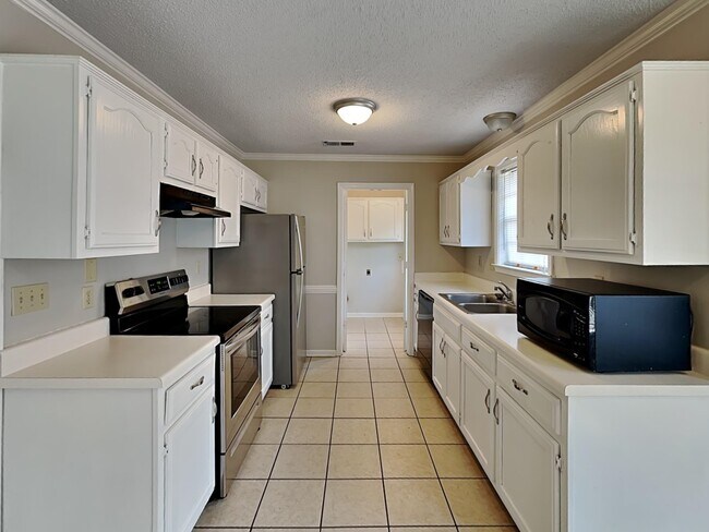 Foto del edificio - 5863 Pipers Green Ln