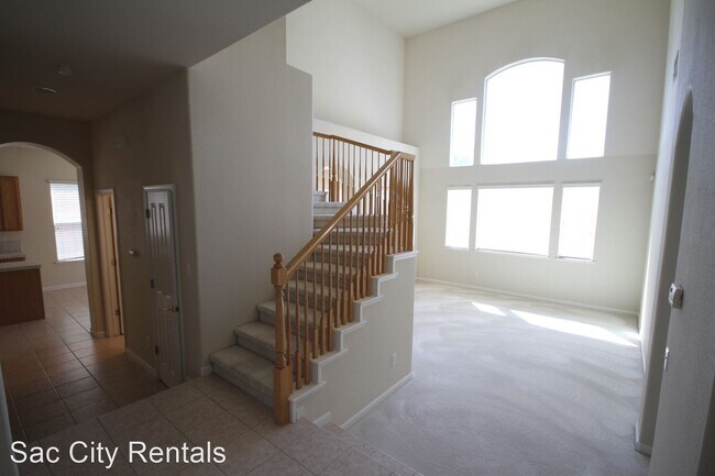 Building Photo - 4 br, 3.5 bath House - 9808 Burrowing Owl Way