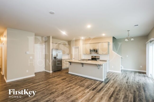 Foto del edificio - 10721 Rivergate Dr NW