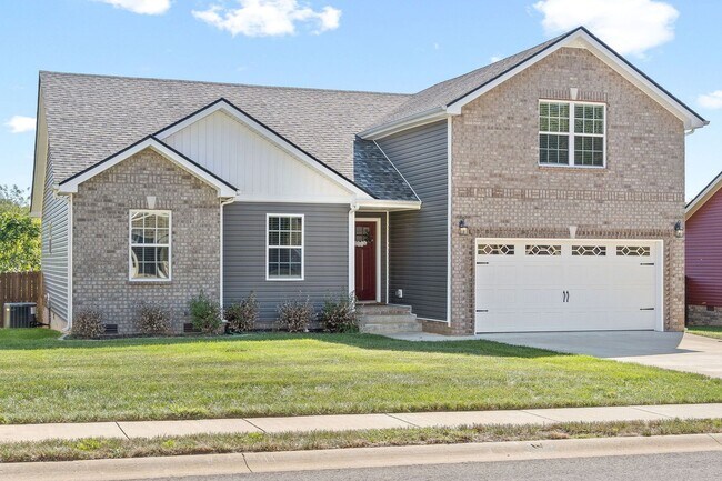 Building Photo - Pet Friendly Three Bedroom with Bonus!
