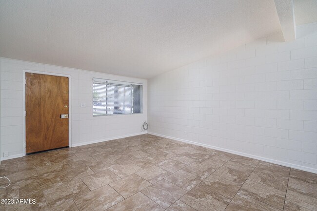 Building Photo - 7025 E Wilshire Dr