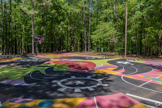 Stone Hogan Park boasts a vibrant collection of basketball courts, each uniquely adorned by local artists with stunning murals that bring the space to life.