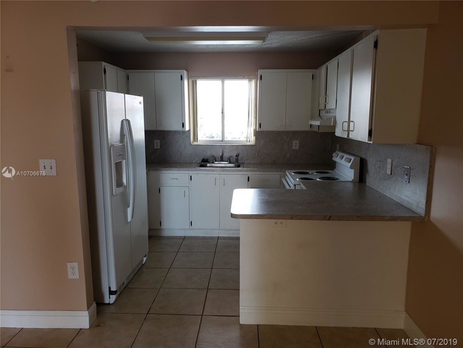 Building Photo - 7865 W 30th Ct