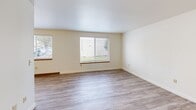 Located at 1794 SW Fellows St in McMinnville, Oregon, this single-floor, 2-bedroom, 1-bathroom apartment offers a functional and well-organized layout. The living room is a bright, open space featuring durable light-toned laminate flooring and multiple windows that allow natural light to fill the room, with views of the surrounding greenery outside.

The kitchen and dining area are combined into one efficient space. The kitchen features white cabinetry with warm wood-toned trim, laminate countertops, a peninsula with a sink, and white appliances including a range and refrigerator. The laminate flooring carries through this area, adding cohesion to the open-plan design.

Both bedrooms are carpeted and offer a quiet, comfortable retreat. Each bedroom includes a sliding double-door closet with natural wood-finish panels, providing generous storage. The primary bedroom is a well-proportioned room with a window that brings in natural light. Additional closets throughout the unit, totaling three, ensure ample storage space.

The bathroom is clean and straightforward, featuring a full tub/shower combo, toilet, and a vanity with a wood-toned cabinet. Laminate flooring ties the room together neatly. In-unit laundry adds everyday convenience to this well-rounded apartment in McMinnville.