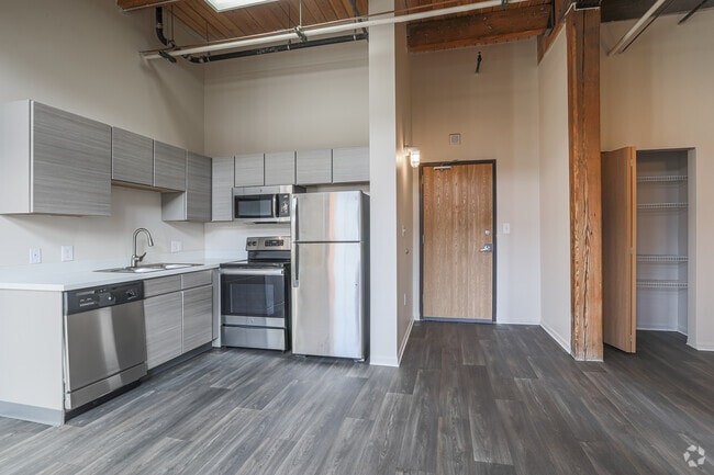 1BR, 1BA - 535SF - Living Room/Kitchen - Amazon Apartments