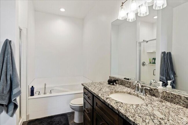 Building Photo - Modern End Unit townhouse w attached 2 car...