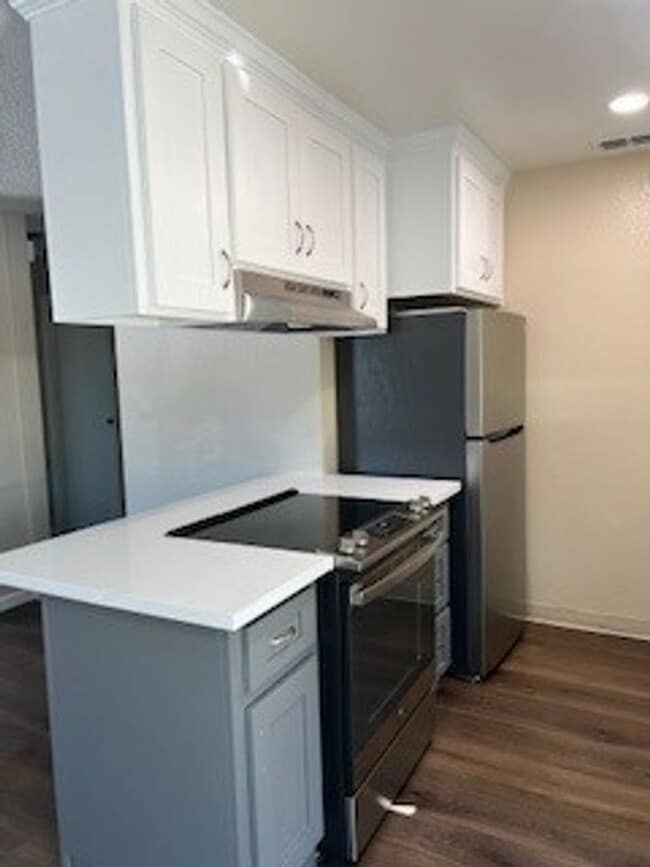 Building Photo - **BE330-Esquivel, H