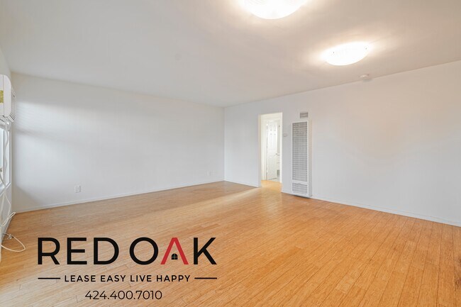 Building Photo - Sun-Drenched One Bedroom with Lovely Floor...