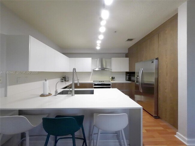 Foto del edificio - 130 Jacaranda Country Club Dr