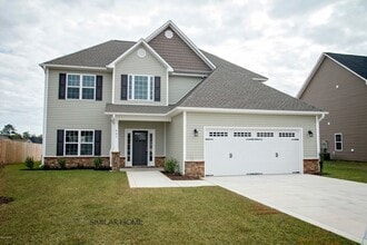 Building Photo - 931 Farmyard Garden Dr