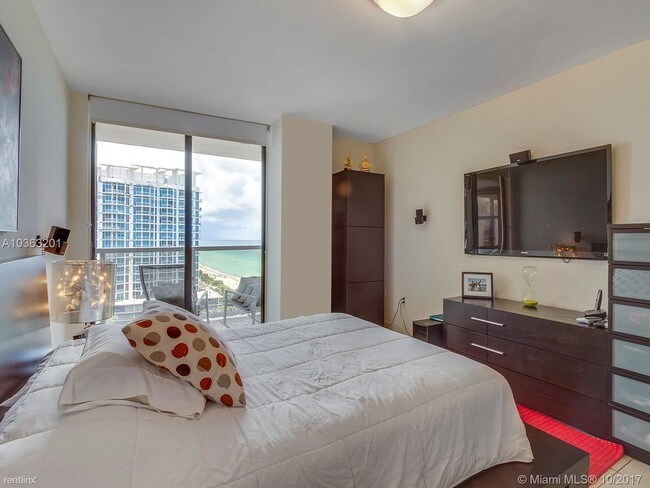 Building Photo - 6423 Collins Ave