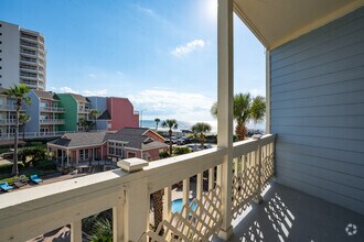 All patios have a gorgeous water view - Oceanfront Lofts