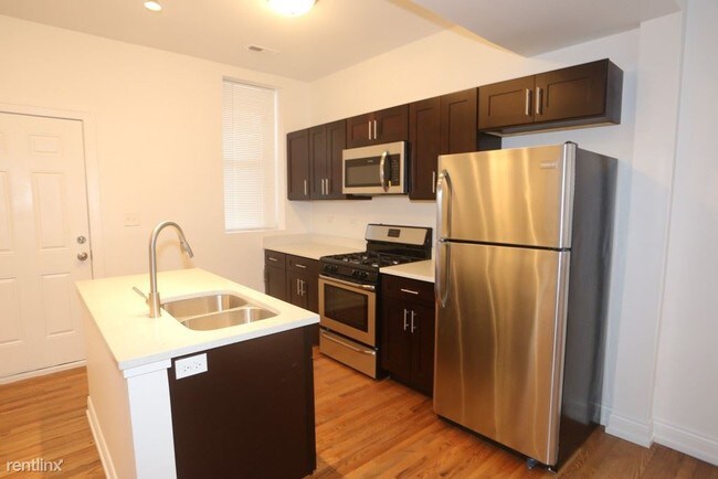 Foto del edificio - 4915 W Cuyler Ave