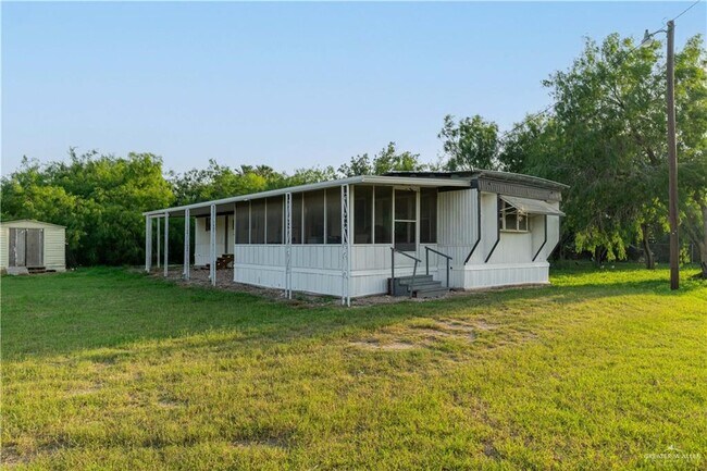 Building Photo - 1221 S Cesar Chavez Rd