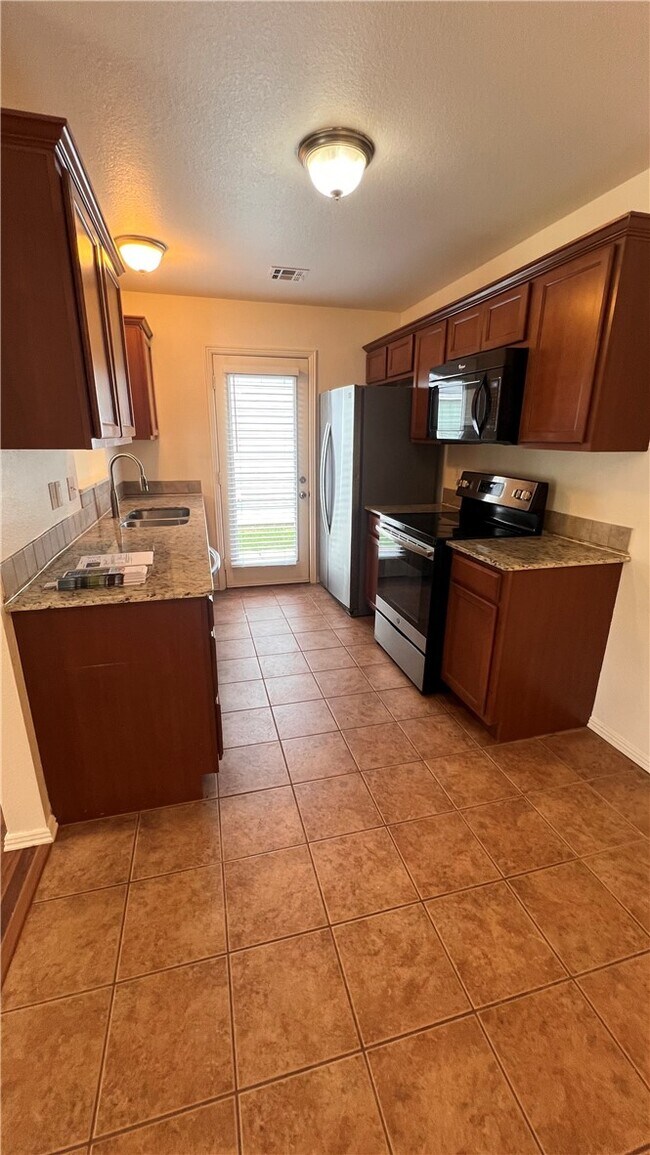 Foto del edificio - 4419 W Pecan St