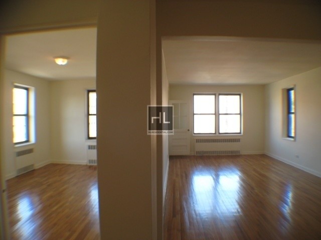Building Photo - 37-09-37-75 75th St