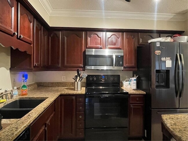 Building Photo - 9481 Highland Oak Dr