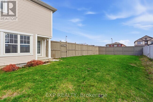 Photo du bâtiment - 100 Cranesbill Rd