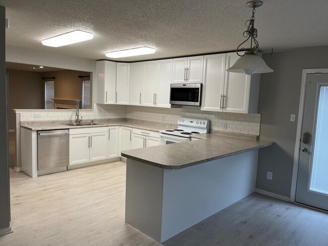Building Photo - 6848 Tadpole Ct