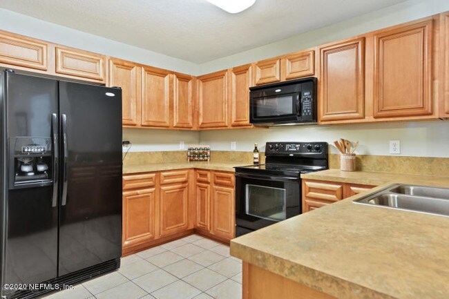 Foto del edificio - 6984 Ortega Woods Dr