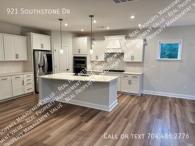 Building Photo - New home with many community amenities yet...