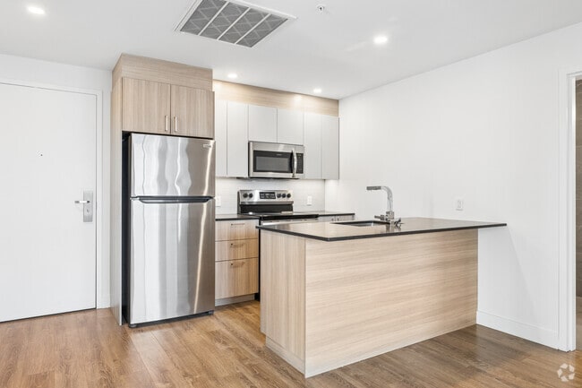 3 chambres, 1 salle de bain - 91 m² - Cuisine - Vue Phase 7