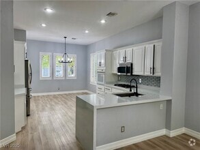 Building Photo - 11 Feather Sound Dr