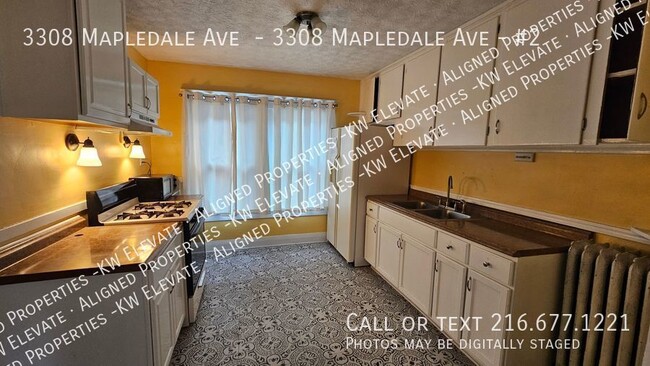 Building Photo - Bright & Vibrant 2 bedroom on Mapledale!