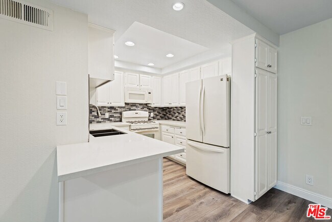 Foto del edificio - 8512 Tuscany Ave