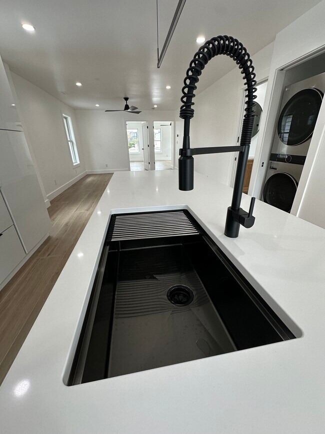 Kitchen sink with disposal - 1285 W 67th St