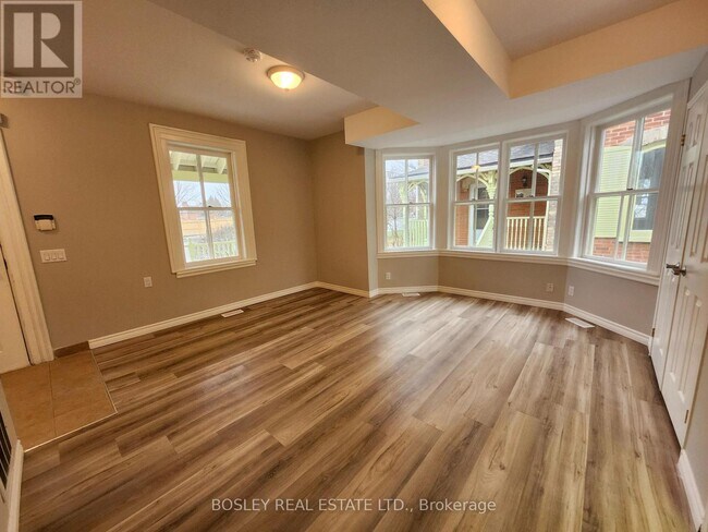 Building Photo - 5958 6th Avenue Wood