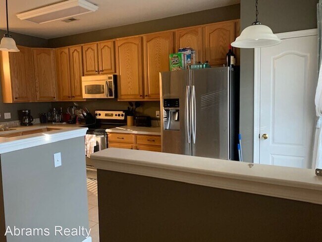 Building Photo - 3 br, 2.5 bath House - 3818 Magwood Court